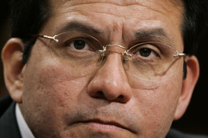 Attorney General Alberto Gonzales takes questions by the Senate Judiciary Committee on whether President Bush, and others in the executive branch, acted illegally in permitting domestic surveillance by the National Security Agency, on Capitol Hill in Washington, Monday, Feb. 6, 2006. He insisted that President Bush is fully empowered to eavesdrop on Americans without warrants as part of the war on terror and he cautioned Congress not to end or tinker with the program.  (AP Photo/J. Scott Applewhite) (J. Scott Applewhite)