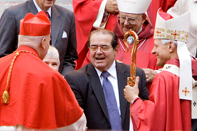 Archbishop of Washington Donald Wuerl greets Associate Supreme Court Justice Antonin Scalia after the celebration of the Red Mass at St. Matthews Cathedral in Washington, DC, October 5, 2008. The Red Mass is celebrated at the start of the Supreme Court term.