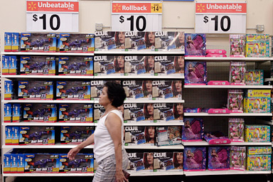 In this Oct. 2, 2008 file photo, a shopper strolls pass the ten dollar toys on display at a Wal-Mart Supercenter in Rosemead, Calif. Wal-Mart Stores Inc., the world's largest retailer, said Thursday, Nov. 6, 2008, its low-price focus and sales of Halloween merchandise boosted October same-store sales by 2.4 percent, ahead of expectations.