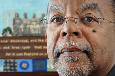 In this photo taken Friday, Jan. 18, 2008, Henry Louis Gates Jr., historian and Director of the W. E. B. Du Bois Institute for African and African American Research at Harvard University, poses for a photograph in his home in Cambridge, Mass. Gates has accused the Cambridge police of racism after being arrested trying to get into his own locked home near Harvard University on Thursday, July 16, 2009.