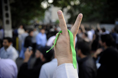 In this citizen photograph taken Sunday, June 28, 2009, a supporter of pro-reform leader Mir Hossein Mousavi, flashes a victory sign during a gathering at the Ghoba Mosque in Tehran, Iran. Several thousand protesters who had gathered near north Tehran's Ghoba Mosque clashed with riot police in Tehran on Sunday in the country's first major post-election unrest in four days.