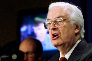 Rep. Henry Hyde (R-IL) speaks with members of the press in this file image from January 21, 1999