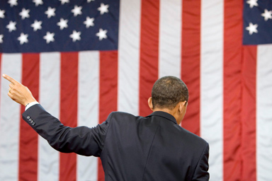 U.S. President Barack Obama gestures during a town hall meeting about healthcare at the Broughton High School in Raleigh, North Carolina July 29, 2009.
