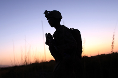 A U.S Marine from Delta Company of 2nd Light Armored Reconnaissance Battalion patrols near the town of Khan Neshin in Rig district of Helmand province, southern Afghanistan September 10, 2009.