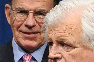 In this May 12, 2008, photo, Paul Kirk, Jr., left, chairman of the John Kennedy Library Foundation Board of Directors, is seen alongside the late Sen. Edward Kennedy at the annual Profile in Courage Award ceremonies at the John F. Kennedy Presidential Library and Museum in Boston.