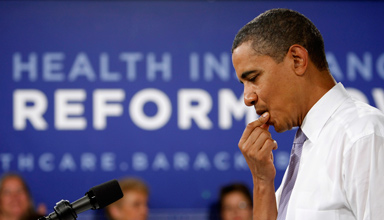 U.S. President Barack Obama speaks during an Organizing for America national healthcare forum at the Democratic National Committee Headquarters in Washington August 20, 2009.