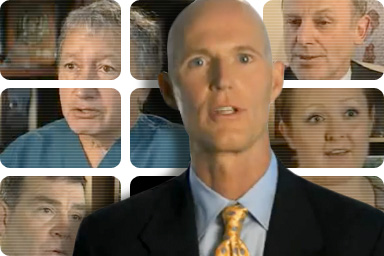 Rick Scott, foreground.