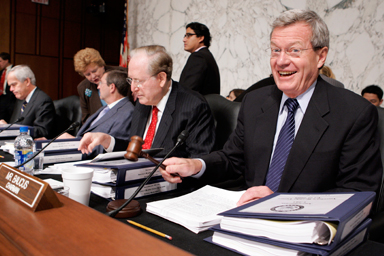 Senate Finance Committee Chairman Sen. Max Baucus, D-Mont., right, gavels the start of the markup of health care legislation on Capitol Hill in Washington, Tuesday, Sept. 29, 2009. From left are, Sen. Jeff Bingaman, D-N.M., Sen. Debbie Stabenow, D-Mich., Sen. Kent Conrad, D-N.D., Sen. Jay Rockefeller, D-W.Va., and Baucus.