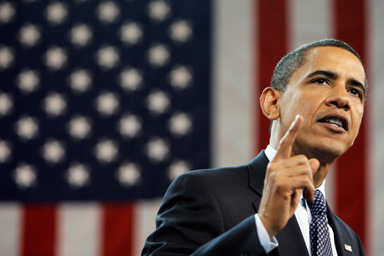 In this July 29 2009 file photo President Barack Obama gestures during a town hall on health care reform, at Broughton High School in Raleigh, N.C.