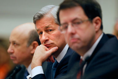 JPMorgan Chase & Co. Chief Executive Officer James Dimon, center, flanked by Goldman Sachs & Co. Chief Executive Officer and Chairman Lloyd C. Blankfein, left, and Bank of New York Mellon Chairman Chief Executive Officer Robert Kelly, are seen on Capitol Hill in Washington, Wednesday, Feb. 11,2009, during a House Financial Services Committee hearing.