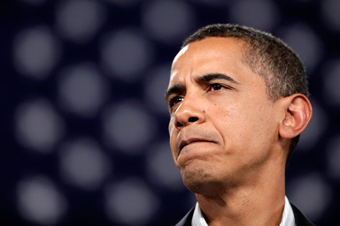 President Barack Obama pauses as he speaks about health care during a town hall meeting at Central High School in Grand Junction, Colo. Saturday, Aug. 15, 2009