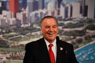 Standing in front of a backdrop of the Chicago skyline, Chicago Mayor Richard M. Daley speaks at a dinner in support Chicago hosting the 2016 Summer Olympics, Wednesday, Sept. 30, 2009, in Copenhagen.