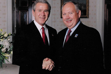 Former President George W. Bush and John C. Metzler, Jr.