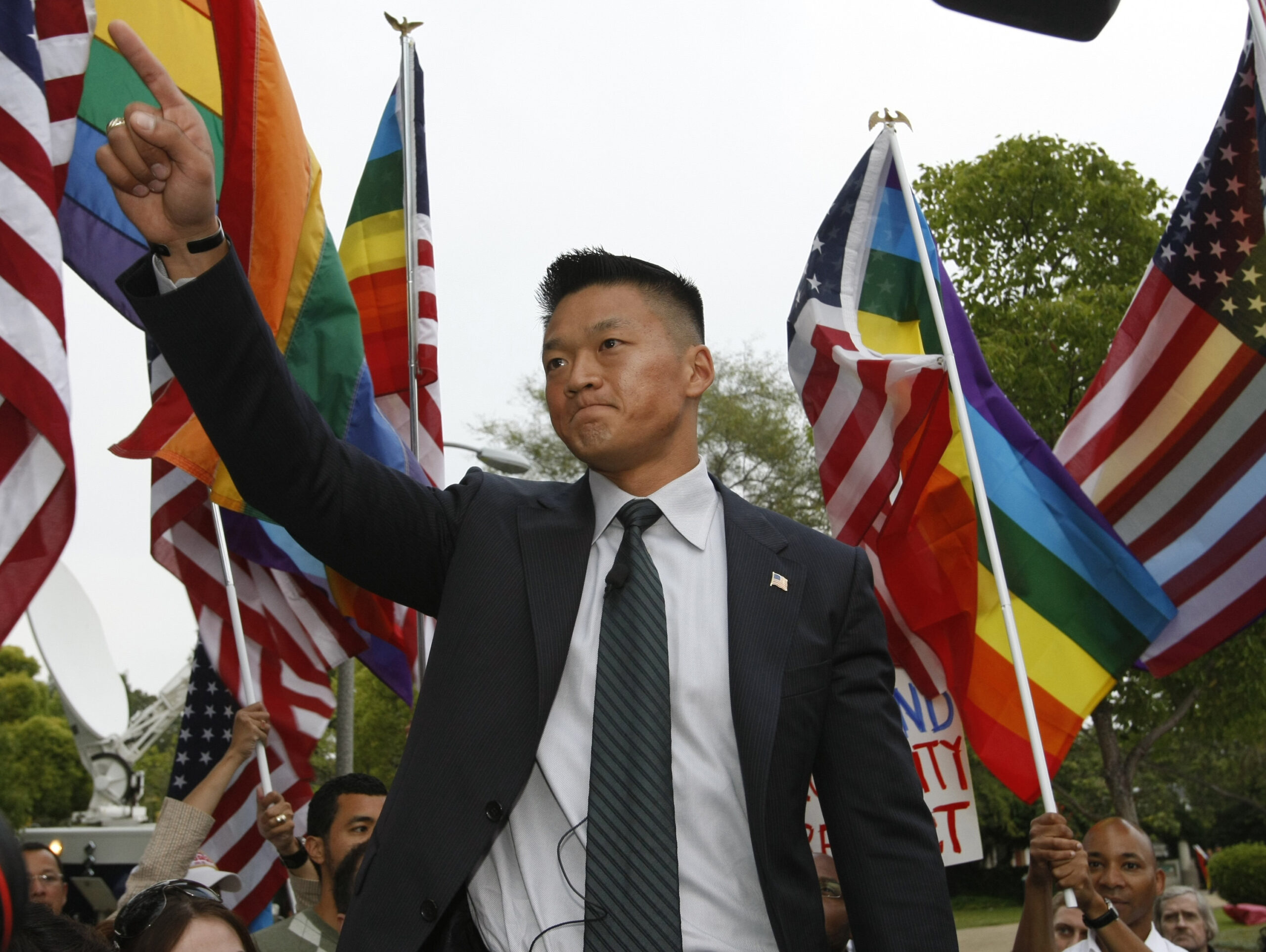 Former US Army Lt. Dan Choi, the first Arabic-speaking specialist dismissed through the 'Don't Ask, Don't Tell' policy under the Obama Administration comments on Prop 8, outside the Beverly Hills hotel, where US president Barack Obama attended a benefit dinner in Beverly Hills, Calif. on Wednesday, May 27, 2009. (AP Photo/Damian Dovarganes) (Damian Dovarganes)