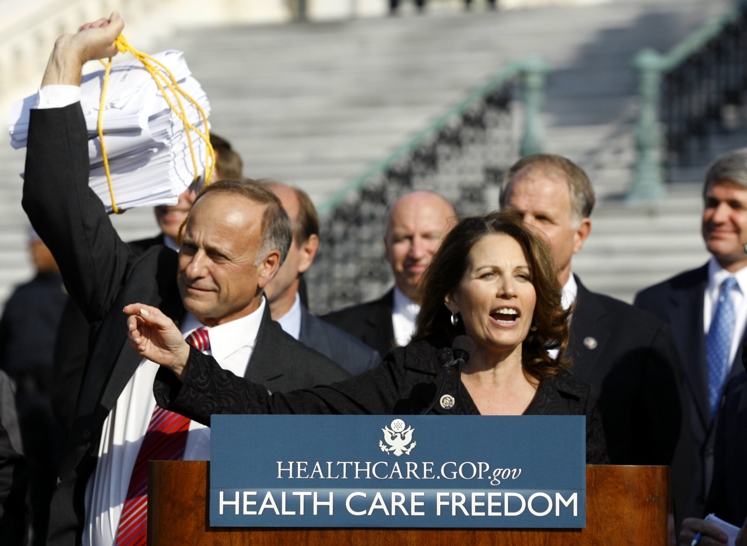 Rep. Michelle Bachmann R-Min., addresses the crowd on Capitol Hill in Washington, Thursday, Nov. 5, 2009, during a Republican health care news conference. Rep. Steve King., R-Iowa, holds the health care bill at left. (AP Photo/Jose Luis Magana) (Associated Press)