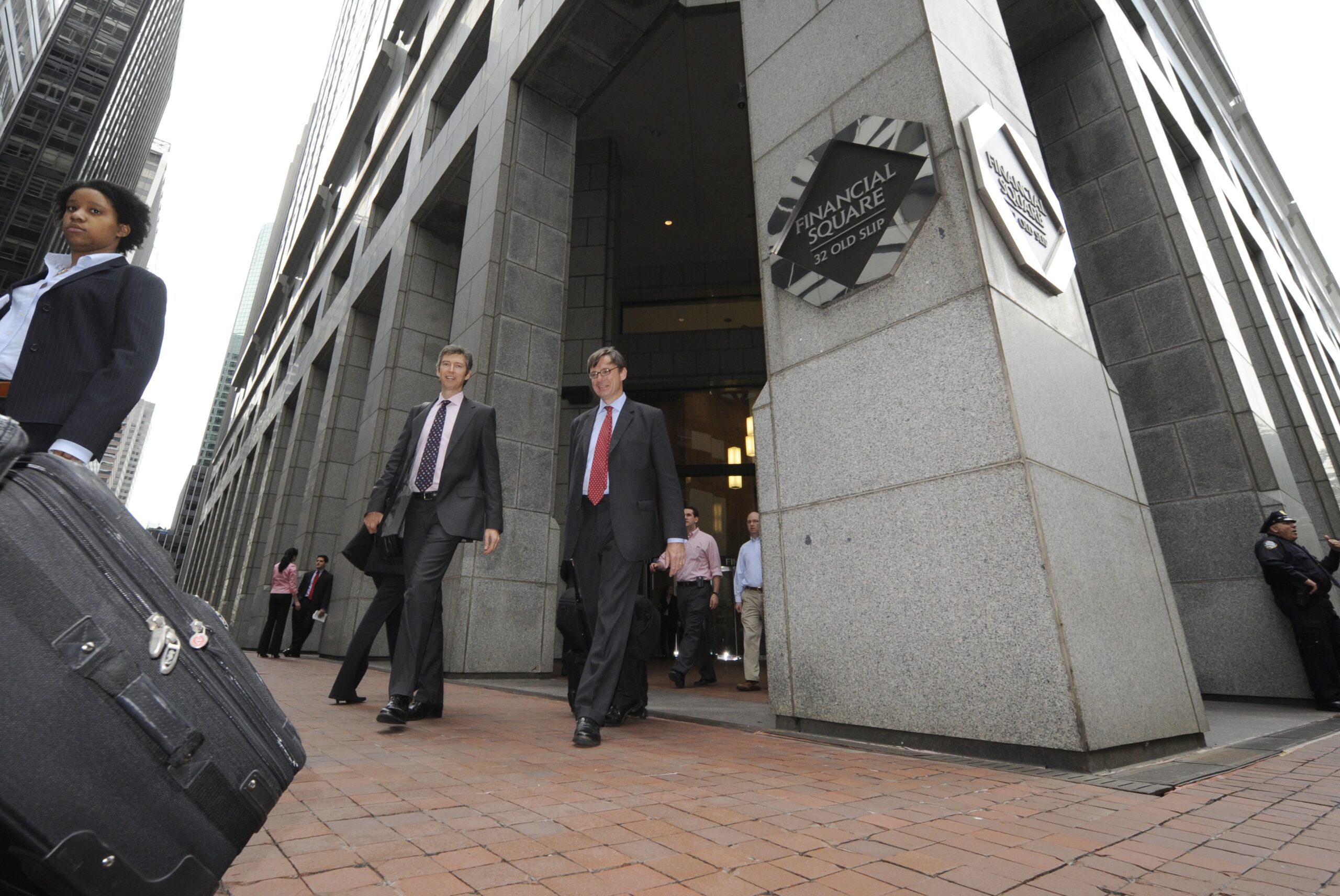People exit the the Financial Square building  following the Goldman Sachs shareholders meeting, Friday, May 8, 2009 in New York. (AP Photo/ Louis Lanzano) (Louis Lanzano)