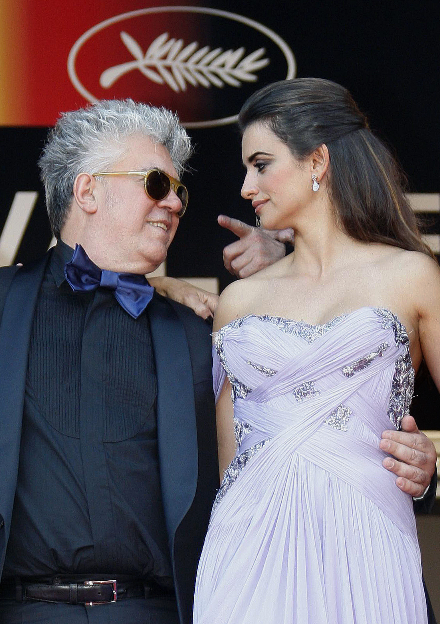Director Pedro Almodovar (L) and cast member Penelope Cruz arrive on the red carpet for the screening of the film "Los Abrazos Rotos" at the 62nd Cannes Film Festival May 19, 2009. Twenty films compete for the prestigious Palme d'Or which will be awarded on May 24.    REUTERS/Regis Duvignau (FRANCE ENTERTAINMENT) (Reuters)