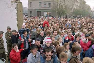 East Berlin citizens crowd the new passage at Bernauer Strasse in Berlin on Saturday, Nov. 11, 1989, where East German border police had torn down segments of the wall. After the opening of the borders on November 9, East Berliners flooded into the western part of the once-divided city.
