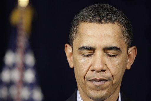 President Barack Obama pauses while speaking at the Marine Corps Base Hawaii in Kaneohe Bay, Hawaii Tuesday, Dec. 29, 2009. (AP Photo/Alex Brandon) (AP)