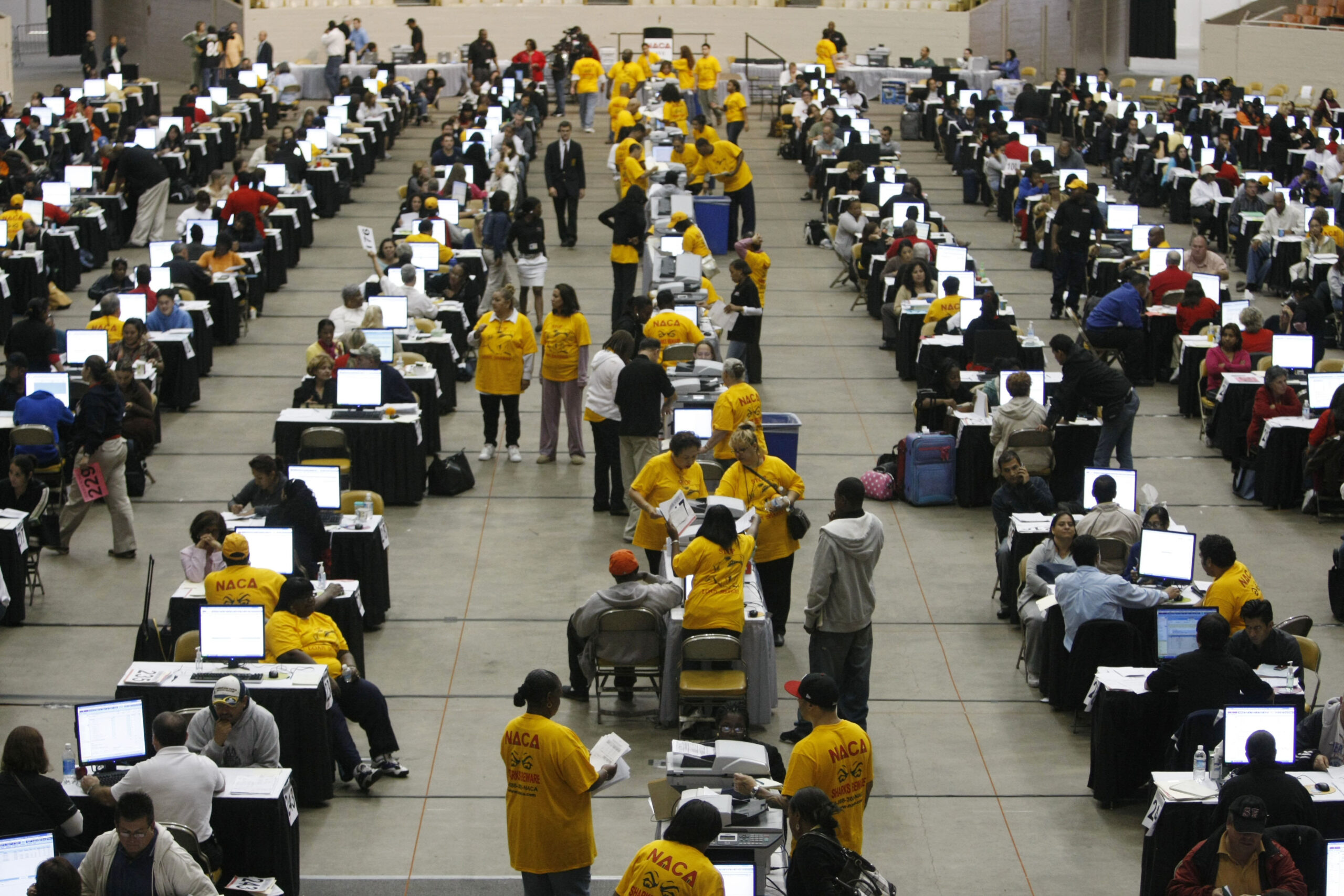 at the Cow Palace in Daly City, Calif., Friday, Oct. 16, 2009. Thousands of home owners turned out to an event sponsored by NACA. A Boston-based non-profit helping people to re-structure high risk loans. (AP Photo/Marcio Jose Sanchez) (Marcio Jose Sanchez)