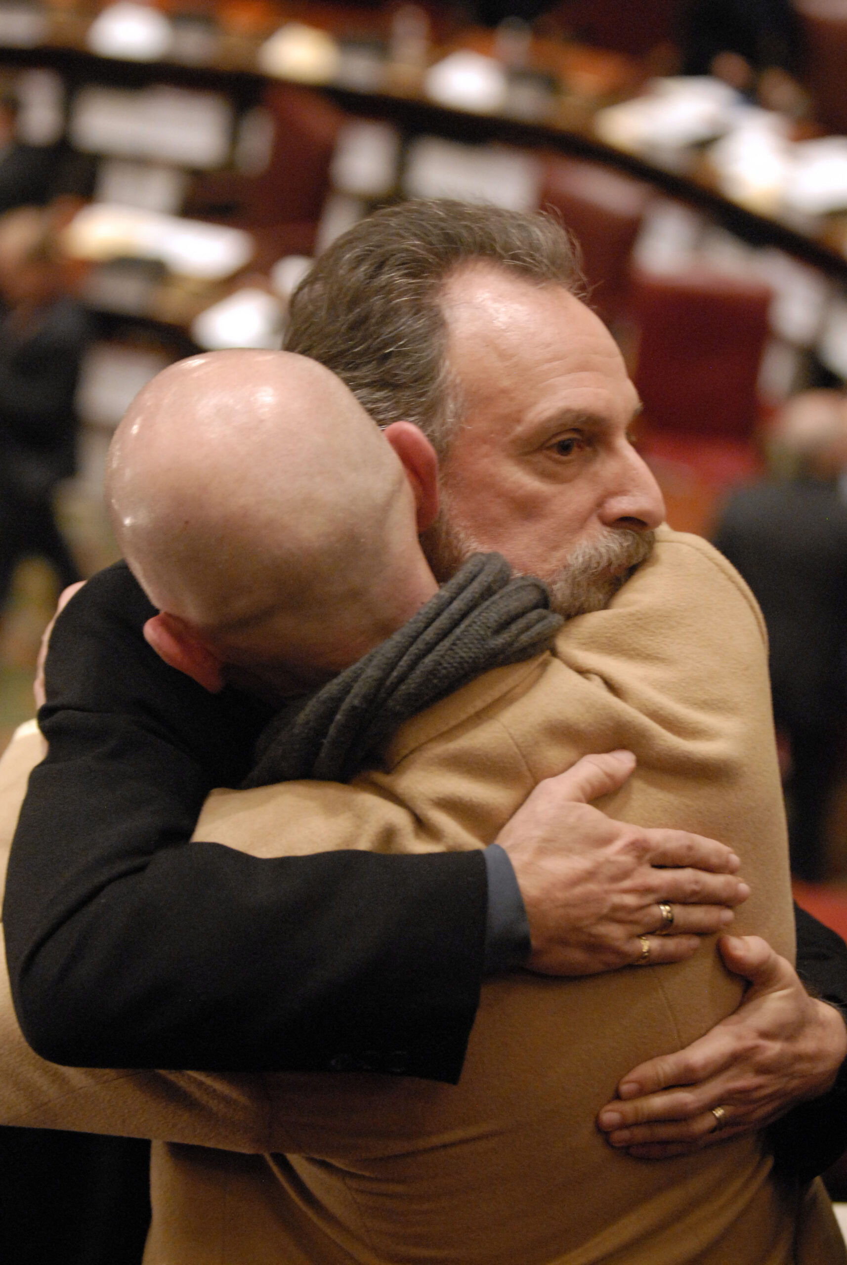 Thomas Sabatino, facing right, of Yonkers, N.Y., consoles Robert Voorheis, his partner of 31 years, after same-sex marriage legislation was defeated in the New York state Senate at the Capitol  N.Y., on Wednesday, Dec. 2, 2009.   Senators voted 38-24 against the bill.  (AP Photo/Tim Roske) (Tim Roske)