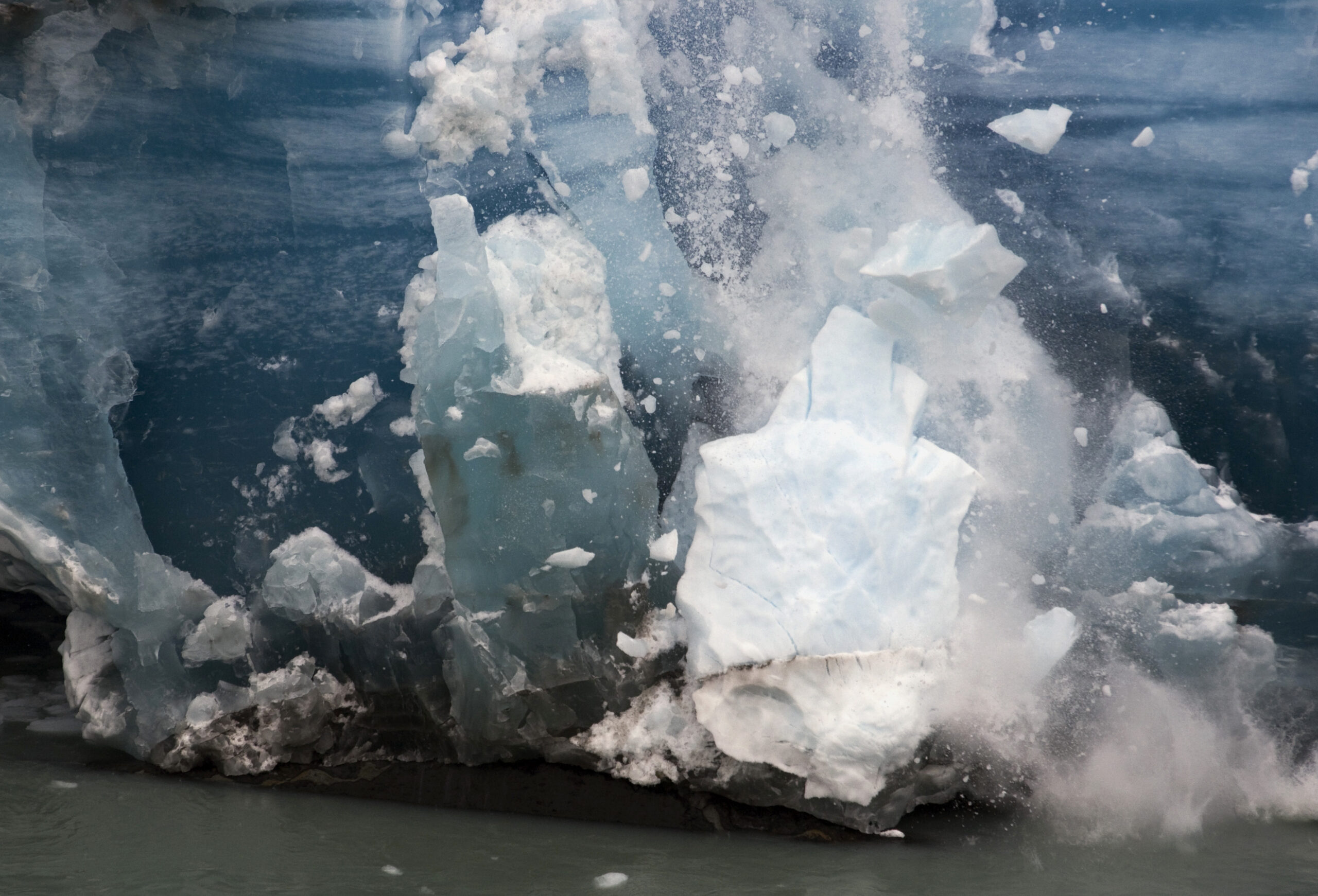 Pieces of ice fall from the front of Argentina's Perito Moreno glacier near the city of El Calafate, in the Patagonian province of Santa Cruz, December 15, 2009. Scientists warn that glaciers in the Andes are melting because of the effects of climate change. According to studies, these accumulations of ice are thawing at a pace so fast that they could disappear in 25 years.    REUTERS/Marcos Brindicci (ARGENTINA) (Reuters)