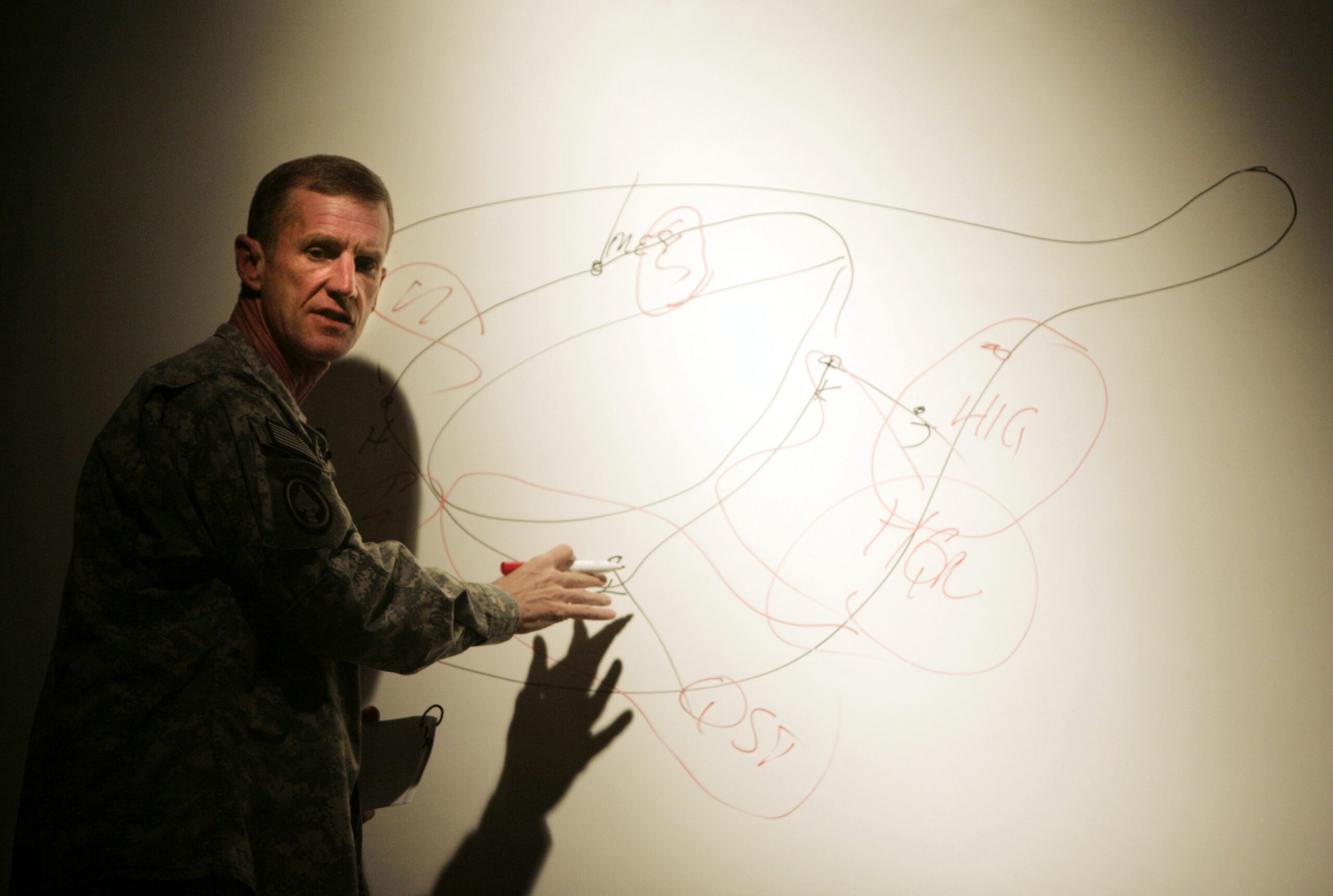 The top U.S. and NATO commander in Afghanistan, General Stanley McChrystal speaks to the military at US base Kandahar Airfield, Kandahar, Afghanistan, December 2, 2009. The first of 30,000 new U.S. troops will arrive in Afghanistan in two to three weeks, top U.S. officials said on Wednesday, even as they made clear plans to start bringing the soldiers home in 18 months could slip.  REUTERS/Mustafa Quraishi/Pool (AFGHANISTAN CONFLICT MILITARY POLITICS) (Reuters)