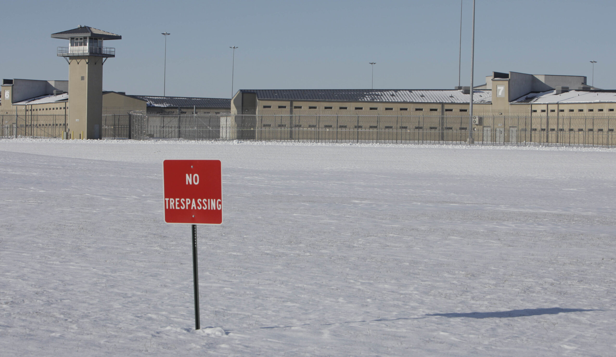 A No Trespassing sign stands in the snow outside the Thomson Correctional Center, Tuesday, Dec. 15, 2009, in Thomson, Ill. President Barack Obama today ordered the federal government to acquire the state prison in Thomson to be the new home for a limited number of terror suspects now held at the U.S. detention facility at Guantanamo Bay, Cuba. The federal government will acquire Thomson Correctional Center, transforming the prison in a sleepy town near the Mississippi River into a prison that exceeds supermax standards. (AP Photo/(M. Spencer Green) (M. Spencer Green)