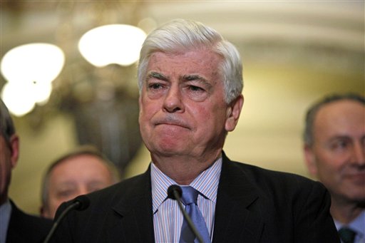 FILE - Sen. Christopher Dodd, D-Conn., pauses during a news conference on health care, in this Dec. 14, 2009 file photo taken on Capitol Hill in Washington. Democratic officials tell The Associated Press that Dodd won't seek re-election this fall. The five-term Democrat is expected to make an announcement Wednesday Jan. 6, 2010. (AP Photo/Haraz N. Ghanbari, File) (AP)