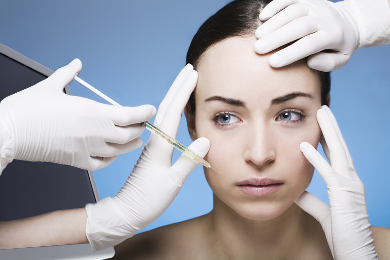 young woman gets a botox injection