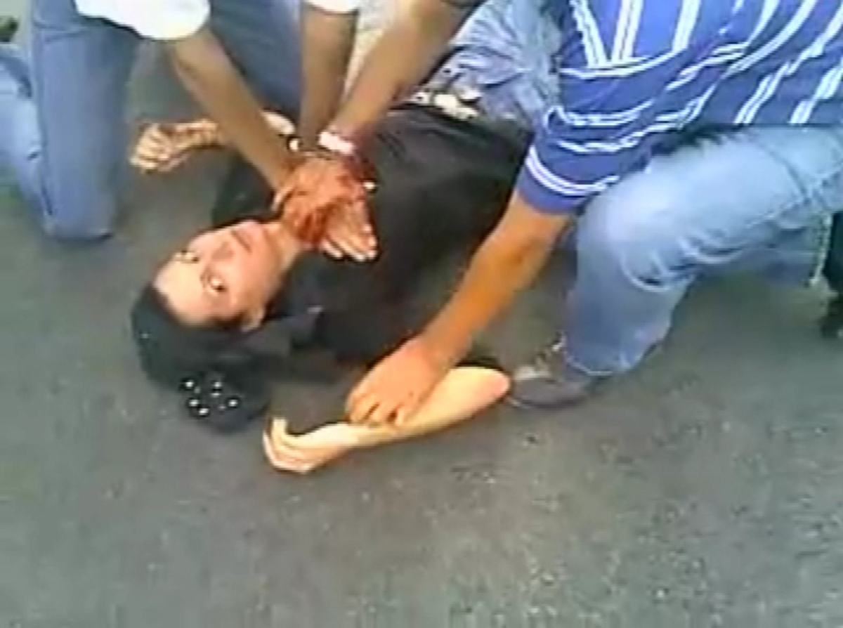 EDITORS' NOTE: Reuters and other foreign media are subject to Iranian restrictions on their ability to report, film or take pictures in Tehran. 

A frame grab from YouTube shows a woman identified as Neda Agha-Soltan lying on the ground after getting shot in the chest in Tehran June 20, 2009. Iranians on social networking sites called for mourning for "Neda", a young woman shot dead on Saturday. Footage of her death has been watched by thousands on the Internet and her image has become an icon of the protests.  

REUTERS/YouTube   (IRAN POLITICS ELECTIONS CONFLICT) QUALITY FROM SOURCE. FOR EDITORIAL USE ONLY. NOT FOR SALE FOR MARKETING OR ADVERTISING CAMPAIGNS (Reuters)