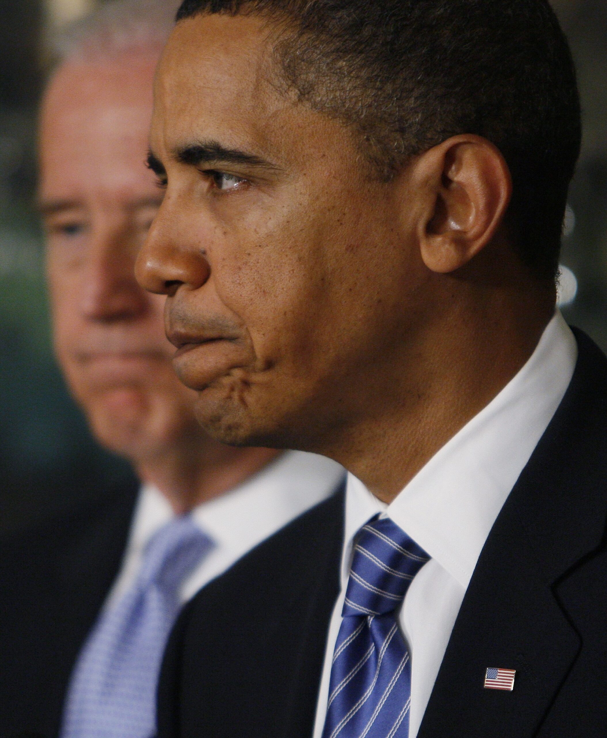 President Barack Obama stands with Vice President Joe Biden as he makes a statement about the earthquake in Haiti,Thursday, Jan. 14, 2010, at the White House in Washington. (AP Photo/Charles Dharapak) (Associated Press)