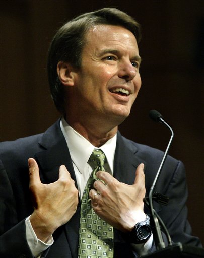 FILE - In this March 10, 2009 file photo, former presidential candidate John Edwards answers a student's question after delivering a speech at Brown University in Providence, R.I.  Edwards has finally come forward to admit that he fathered a child with a videographer he hired before his second White House bid.  (AP Photo/Elise Amendola, File) (AP)