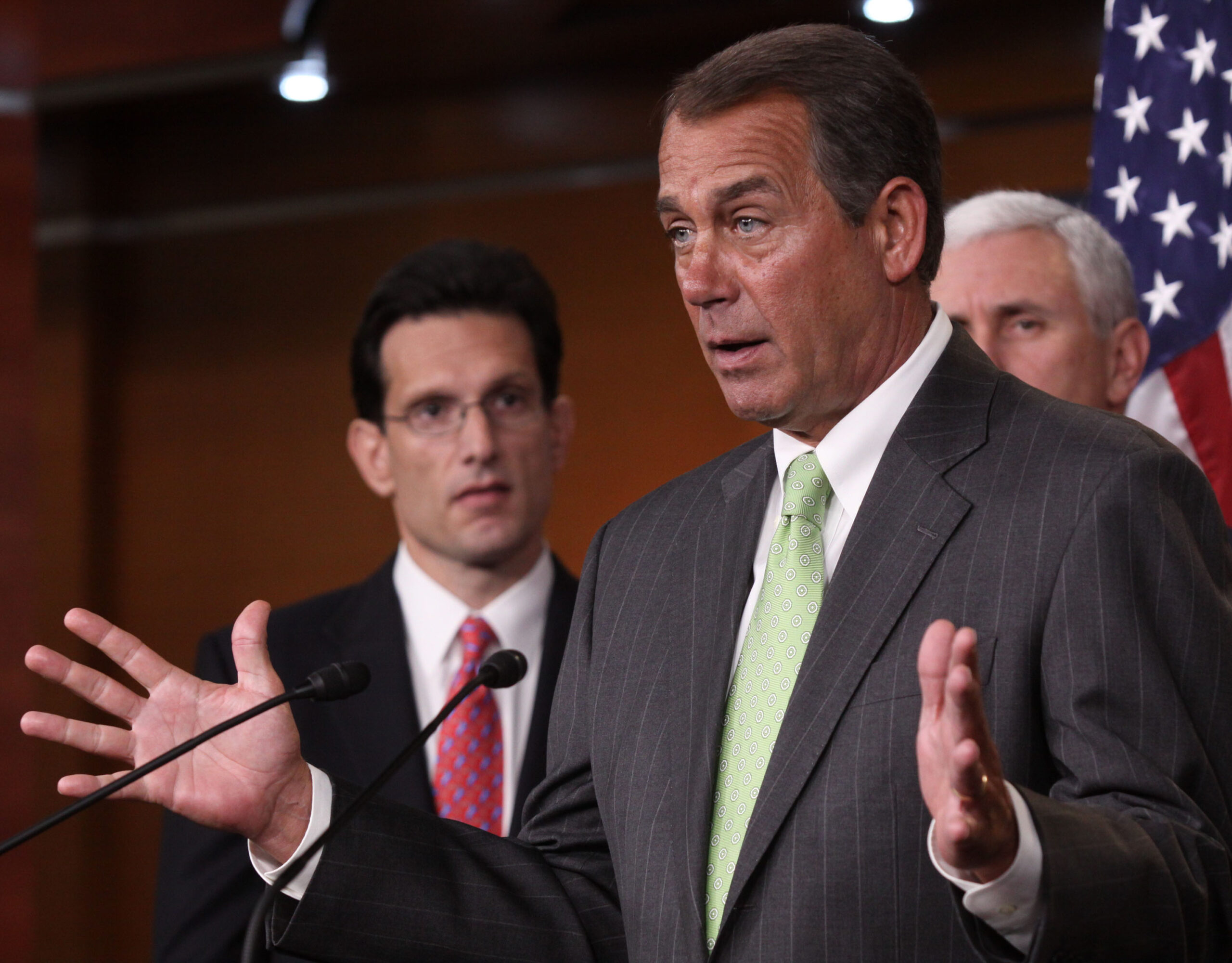 House Minority Leader John Boehner of Ohio, center, accompanied by House Minority Whip Eric Cantor of Va., left, and Rep. Mike Pence, R-Ind., gestures during a news conference on Capitol Hill in Washington, Wednesday, Jan. 20, 2010, to talk about the  Massachusetts Senate election. (AP Photo/Lauren Victoria Burke) (Associated Press)