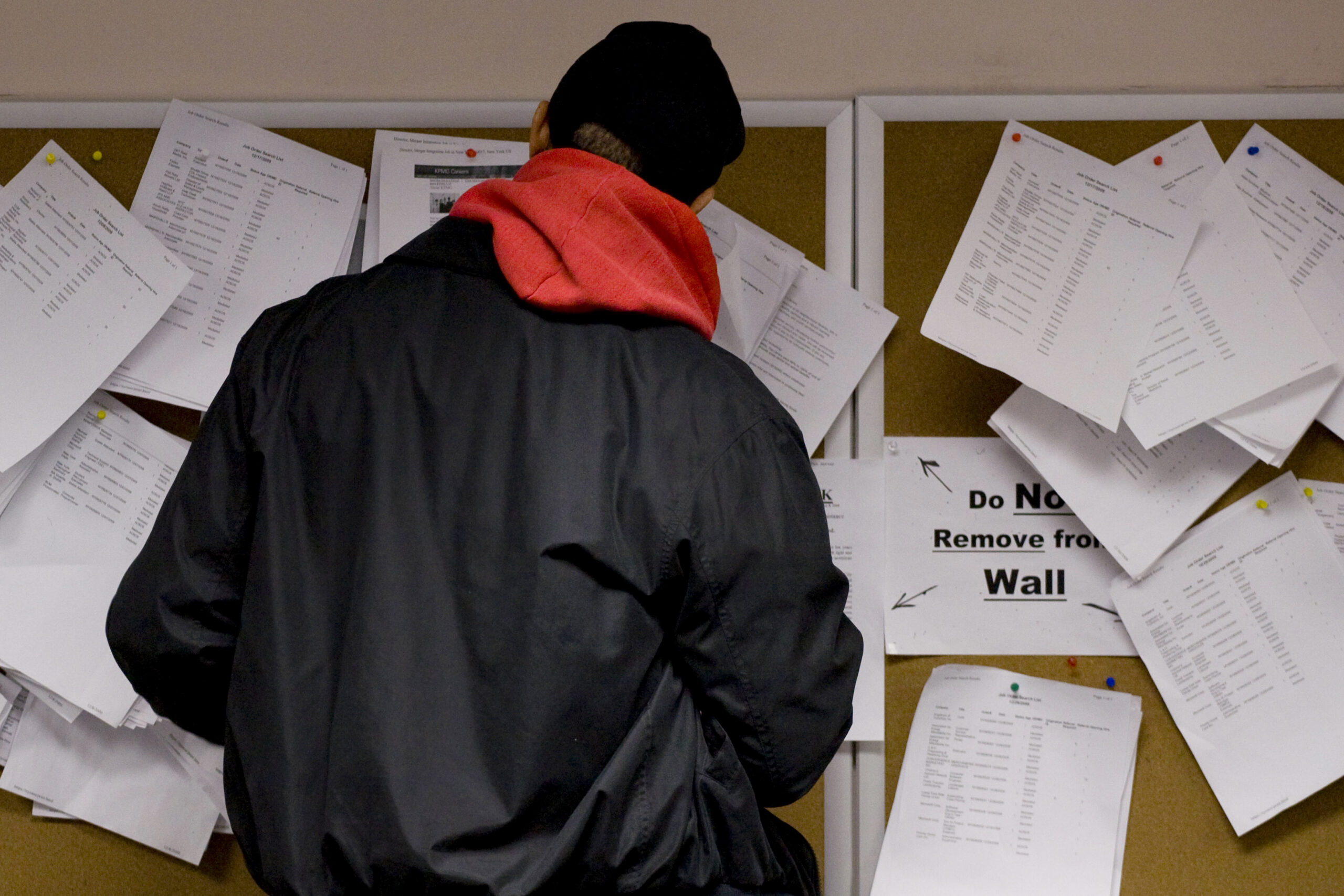 A man searches through job listings in the New York State Labor Department's Division of Employment Services in Brooklyn, N.Y., Wednesday, Jan. 6, 2010. The Labor Department reports on unemployment and jobless claims this week. (AP Photo/Mark Lennihan) (Mark Lennihan)