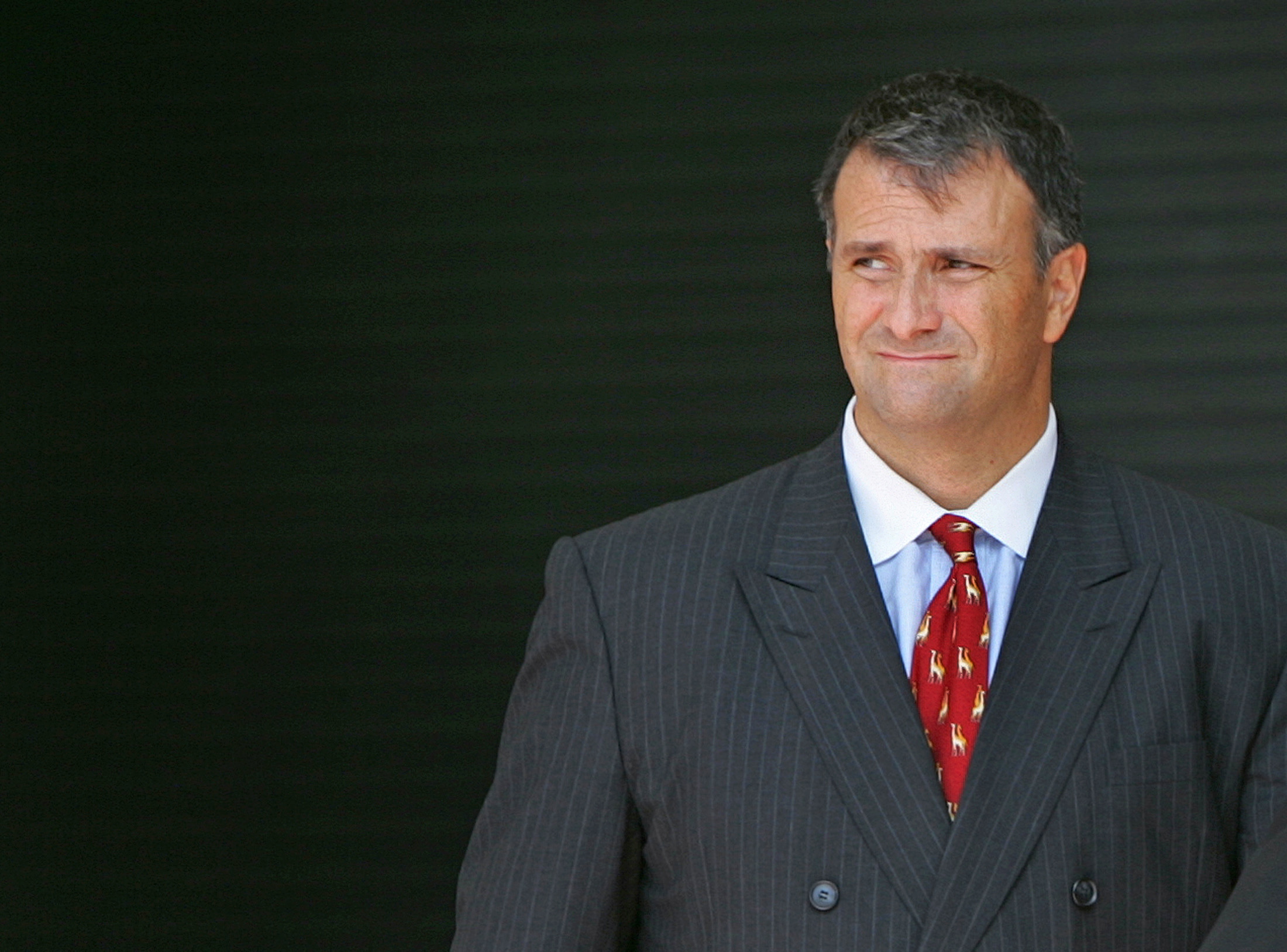 18 Aug 2005, MIAMI, FL, USA --- Washington lobbyist Jack Abramoff leaves the courthouse in Miami August 18, 2005.  Abramoff, a central figure in investigations involving House Majority Leader Tom Delay, plans to fight charges he defrauded two lenders of $60 million to buy a casino cruise line, his lawyer said on Thursday. Abramoff, a well-connected Republican lobbyist, and Adam Kidan, his partner in the $147.5 millions buyout of SunCruz Casino five years ago, were indicted by a federal grand jury in Fort Lauderdale, Florida, on August 11.  --- Image by © CARLOS BARRIA/Reuters/Corbis (© Carlos Barria/reuters/corbis)