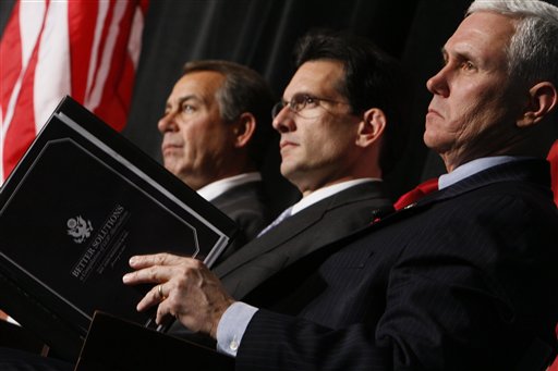 From left, House Minority Leader John Boehner of Ohio, House Minority Whip Eric Cantor of Va., and Rep. Mike Pence, R-Ind., listen as President Barack Obama speaks to Republican lawmakers at the GOP House Issues Conference in Baltimore, Friday, Jan. 29, 2010. (AP Photo/Charles Dharapak) (AP)