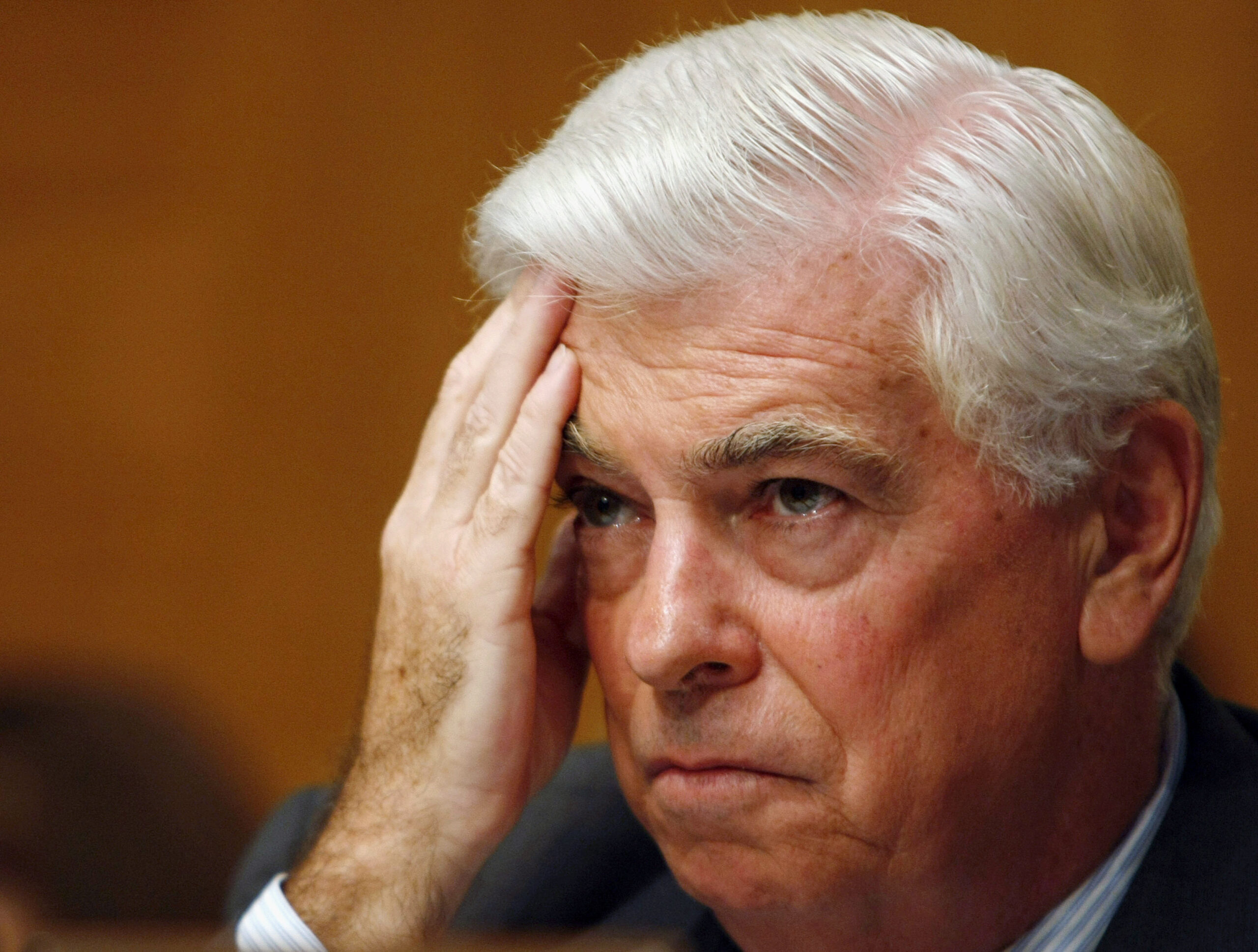 U.S. Senate Banking Committee Chairman Christopher Dodd listens to a testimony at the Senate Banking Committee on Capitol Hill in Washington in this July 23, 2009 file photo. Dodd will announce on January 6, 2010 he will not seek re-election in November, two senior Democratic party aides said. The news, coupled with another Democrat's retirement announcement, underscored the fragility of the Democrats' Senate majority, which is just enough to push President Barack Obama's agenda past Republican procedural obstacles.
  REUTERS/Larry Downing/Files (UNITED STATES - Tags: POLITICS BUSINESS) (Reuters)