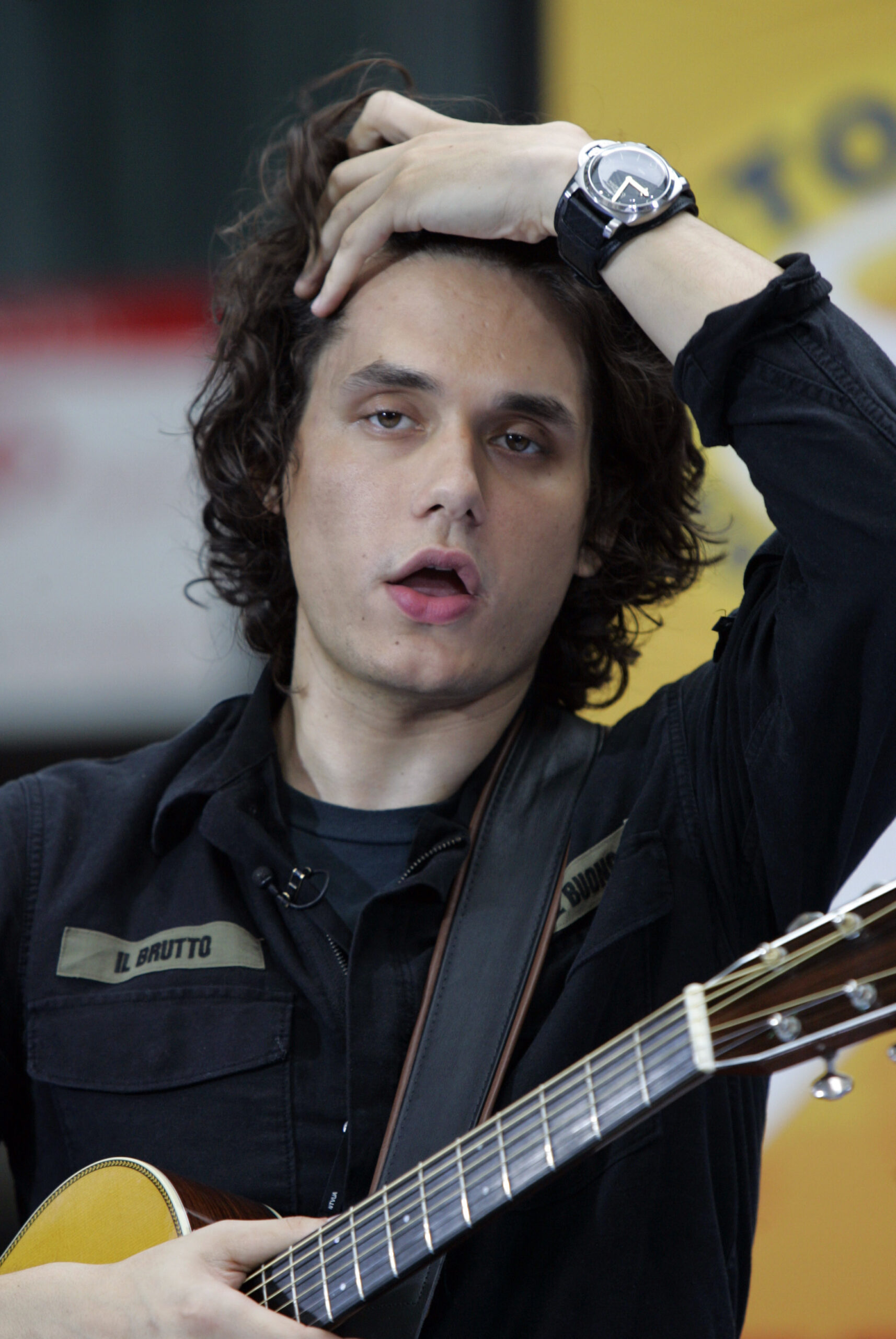 Singer John Mayer rearranges his hair during his appearance on the NBC "Today" television program in New York's Rockefeller Center, Friday Aug. 25, 2006. Mayer began a concert tour with Sheryl Crow in Pittsburgh Thursday Aug. 24, 2006. (AP Photo/Richard Drew) (Associated Press)