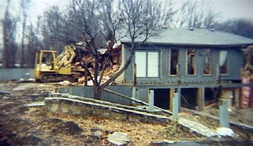 This undated photo released by Terry Hoskins, who allegedly bulldozed his own home after a bank began foreclosure proceedings, shows a bulldozer standing near Hoskins' home in Moscow, Ohio. (AP Photo/Terry Hoskins via WLWT) **NO SALES** (AP)
