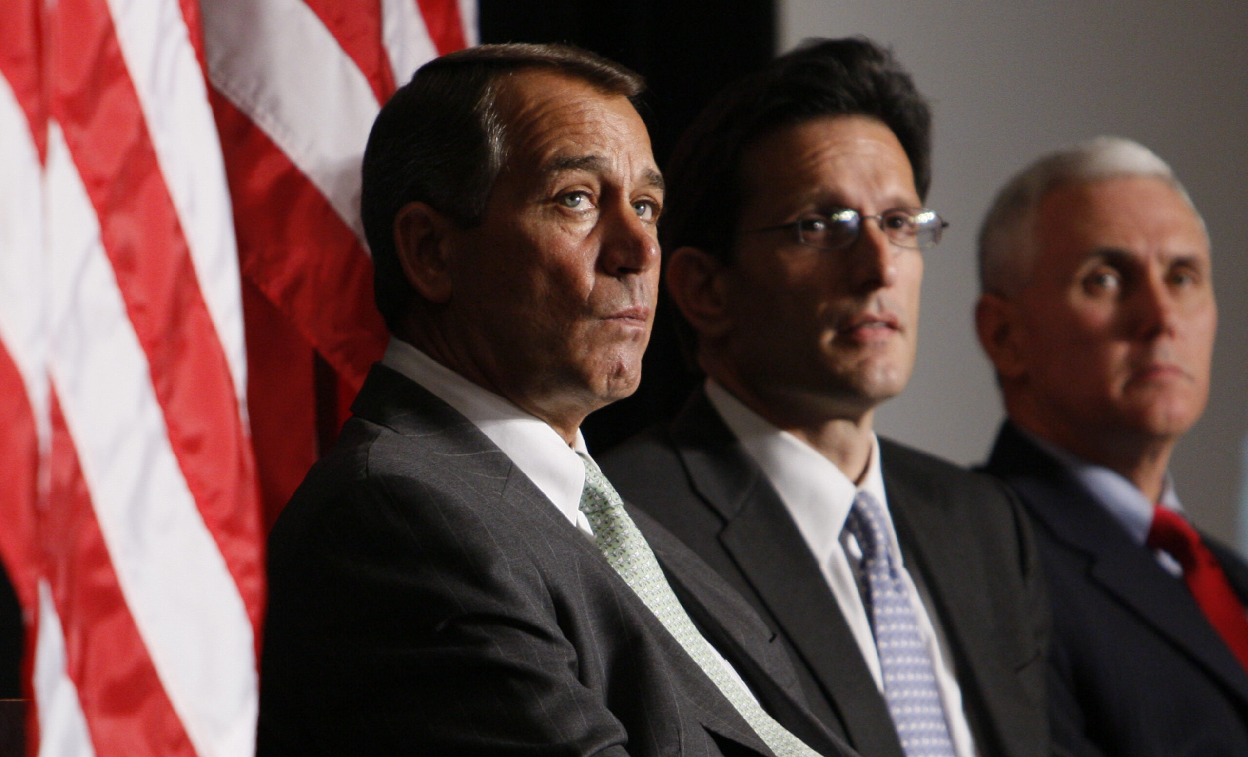 From left, House Minority Leader John Boehner of Ohio, House Minority Whip Eric Cantor of Va., and Rep. Mike Pence, R-Ind., listen as President Obama speaks to Republican lawmakers at the GOP House Issues Conference in Baltimore, Friday, Jan. 29, 2010. (AP Photo/Charles Dharapak) (Associated Press)