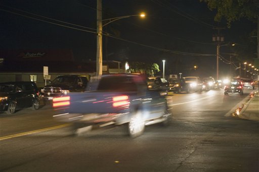 Motorists line up near a gasoline station early Saturday, Feb. 27, 2010, in Ewa Beach, Hawaii. Hawaii is under a tsunami warning after an earthquake of Chile. Many residents are loading up on gas and emergency supplies due to the warning. (AP Photo/Marco Garcia) (AP)