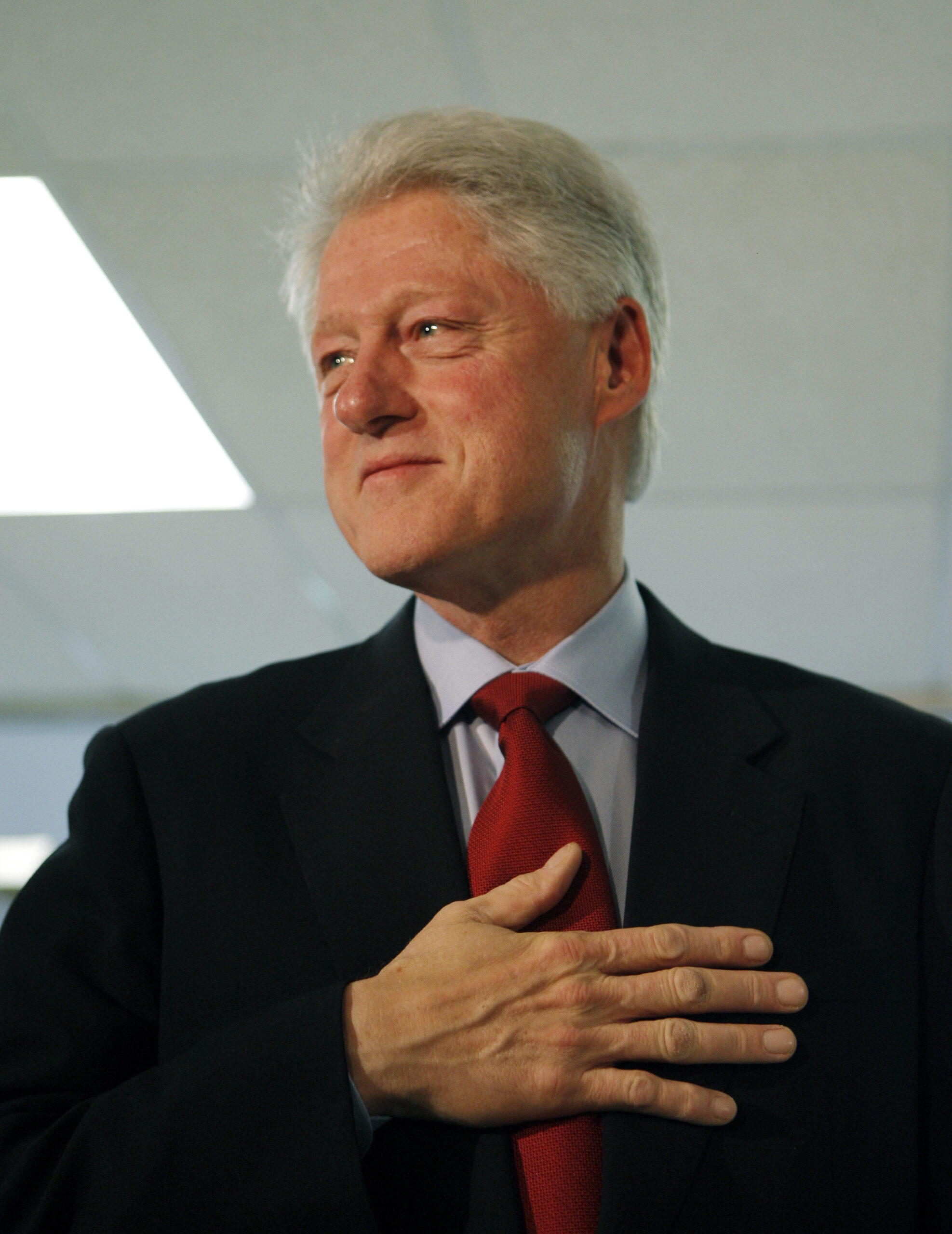 Former U.S. President Bill Clinton holds his hand over his heart as he speaks to reporters after voting for his wife, Democratic presidential candidate U.S. Senator Hillary Clinton (D-NY) in the U.S. presidential primary election at the Douglas Grafflin Elementary School near the Clinton's home in Chappaqua, New York, February 5, 2008.    REUTERS/Mike Segar    (UNITED STATES) US PRESIDENTIAL ELECTION CAMPAIGN 2008 (Â© Mike Segar / Reuters)