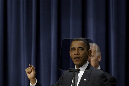 President Barack Obama, accompanied by Vice President Joe Biden, is seen through a teleprompter as he delivers remarks on the economy on the one year anniversary of the signing of the Recovery Act, Wednesday, Feb. 17, 2010, in the South Court Auditorium in the Old Executive Office Building on the White House campus in Washington. (AP Photo/Pablo Martinez Monsivais) (AP)