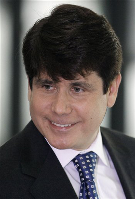 FILE - In this April 21, 2009, file photo, ousted Illinois Gov. Rod Blagojevich is seen leaving federal court in Chicago. The former Illinois governor told Esquire magazine in its February issue that he's "blacker than Barack Obama" and that he was a real person in a political arena dominated by phonies. (AP Photo/M. Spencer Green, file) (M. Spencer Green)