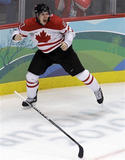 Canada's Sidney Crosby (87) reacts after scoring the game-winning goal in the overtime period of a men's gold medal ice hockey game against USA at the Vancouver 2010 Olympics in Vancouver, British Columbia, Sunday, Feb. 28, 2010. (AP Photo/Chris O'Meara) (AP)