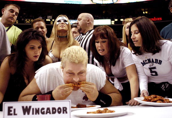PHILADELPHIA - FEBRUARY 4:  Bill "El Wingador" Simmons is cheered on during Wing Bowl 13 at the Wachovia Center February 4, 2005 in Philadelphia, Pennsylvania. An estimated 20,000 spectators gathered to watch the buffalo wing eating contest. Wing Bowl started 13 years ago when a Philadelphia radio personality came up with the idea as an alternative to the Superbowl because he believed the Philadelphia Eagles would never again make it to the Superbowl.  (Photo by William Thomas Cain/Getty Images) (Getty Images)