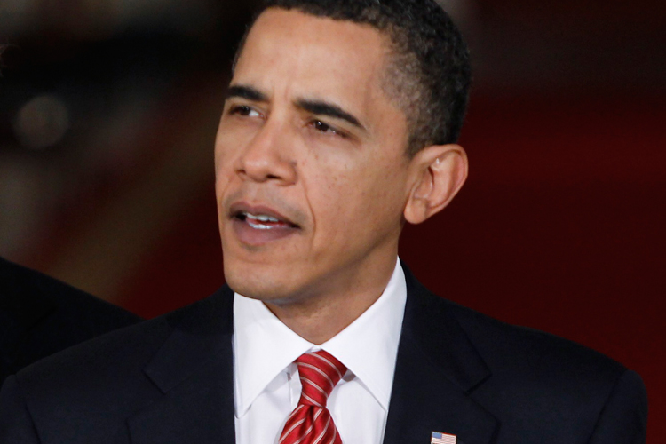 President Obama makes a statement at the White House after the historic healthcare vote on Sunday night.