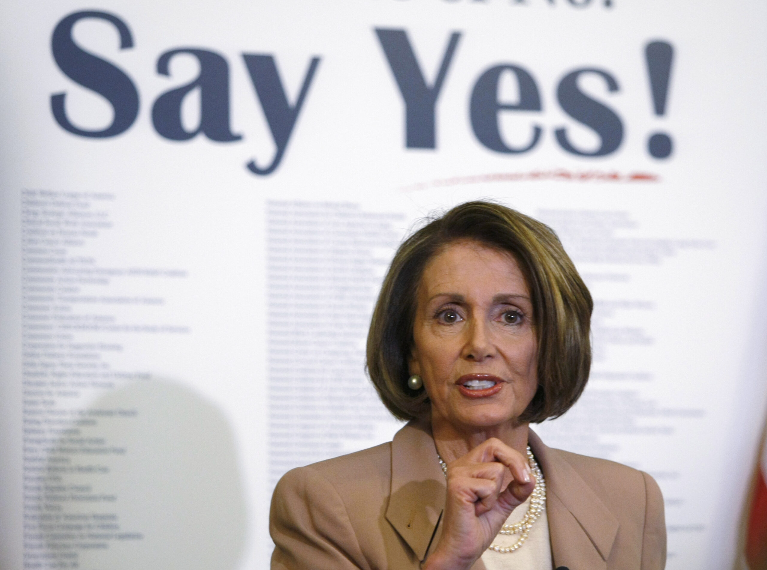 U.S. House Speaker Nancy Pelosi (D-CA) gestures as she addresses her weekly news conference with Capitol Hill reporters in Washington, March 19, 2010. Pelosi on Friday said that when the House of Representatives votes on the healthcare bill, lawmakers will have assurance that the legislation will also be passed by the Senate. 
REUTERS/Hyungwon Kang   (UNITED STATES - Tags: HEALTH POLITICS) (Reuters)