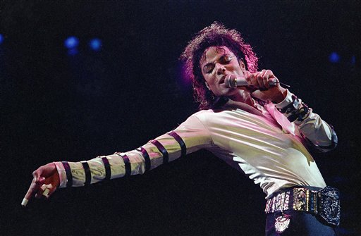 FILE - In this Feb. 24, 1988 file photo, Michael Jackson performs during his 13-city U.S. tour in Kansas City, Mo. The estate of Michael Jackson has landed the late King of Pop the biggest recording deal in history: a $200 million guaranteed contract with Sony Music Entertainment for 10 projects over seven years, according to a person familiar with the deal.  (AP Photo/Cliff Schiappa, File) (AP)
